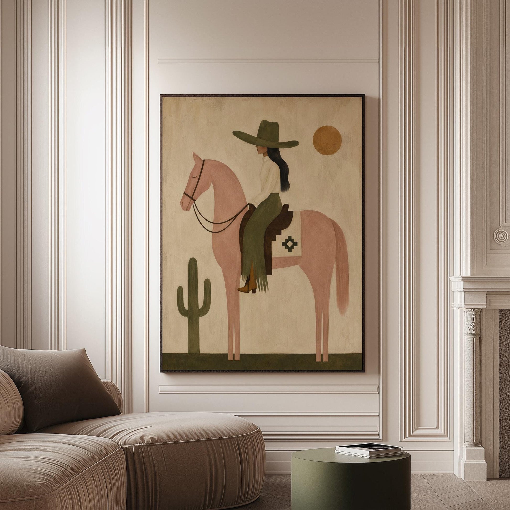 Cowgirl on a dusty pink horse beside a tall saguaro cactus, canvas print on a softly lit wall in a calm interior