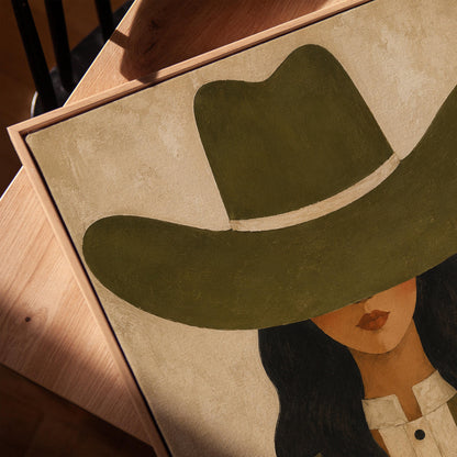 Cowgirl in an olive hat leaning close to a pale white horse, canvas print in a warm, minimally styled interior
