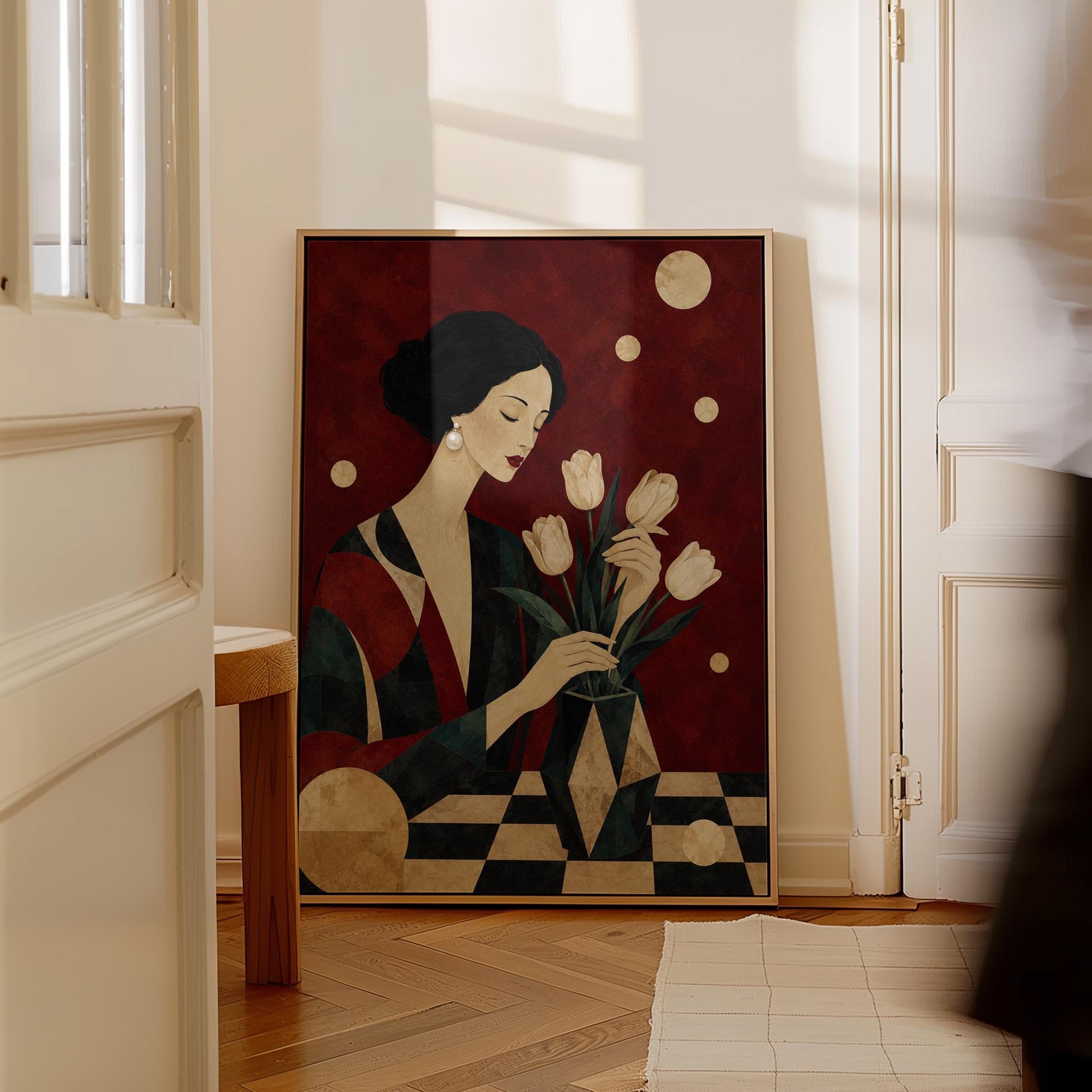 Elegant woman arranging pale cream tulips in a dark geometric vase, canvas print shown to scale in a furnished room