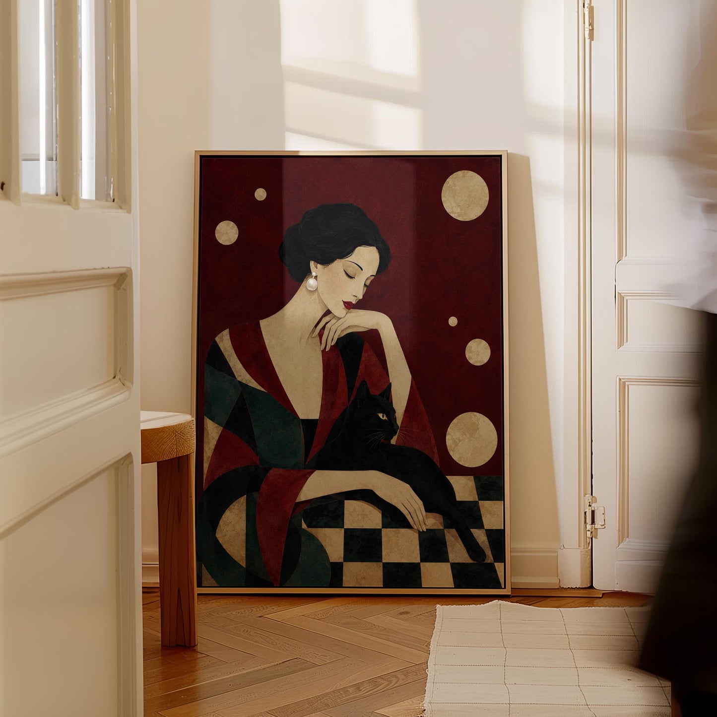 Elegant woman seated with a sleek black cat curled against her arm, canvas print seen in a warm interior with natural light