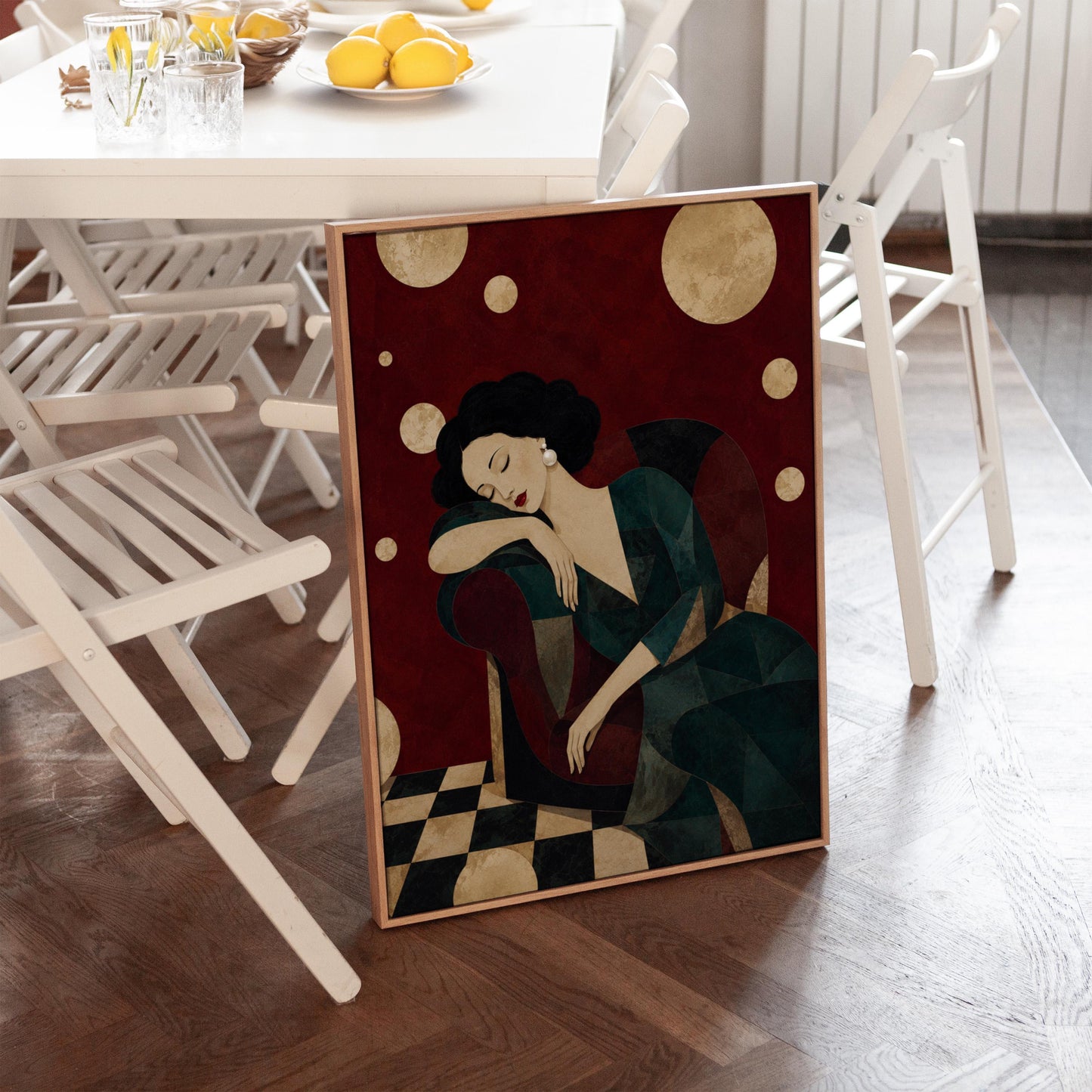 Dark haired woman asleep draped over the back of a deep red armchair, canvas print on a quiet wall in a considered interior