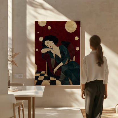 Dark haired woman asleep draped over the back of a deep red armchair, canvas print shown to scale in a furnished room