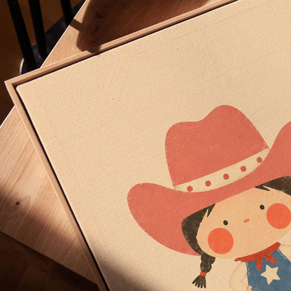 Small cowgirl in a star dress and coral hat with hands on hips, canvas print in a warm, minimally styled interior