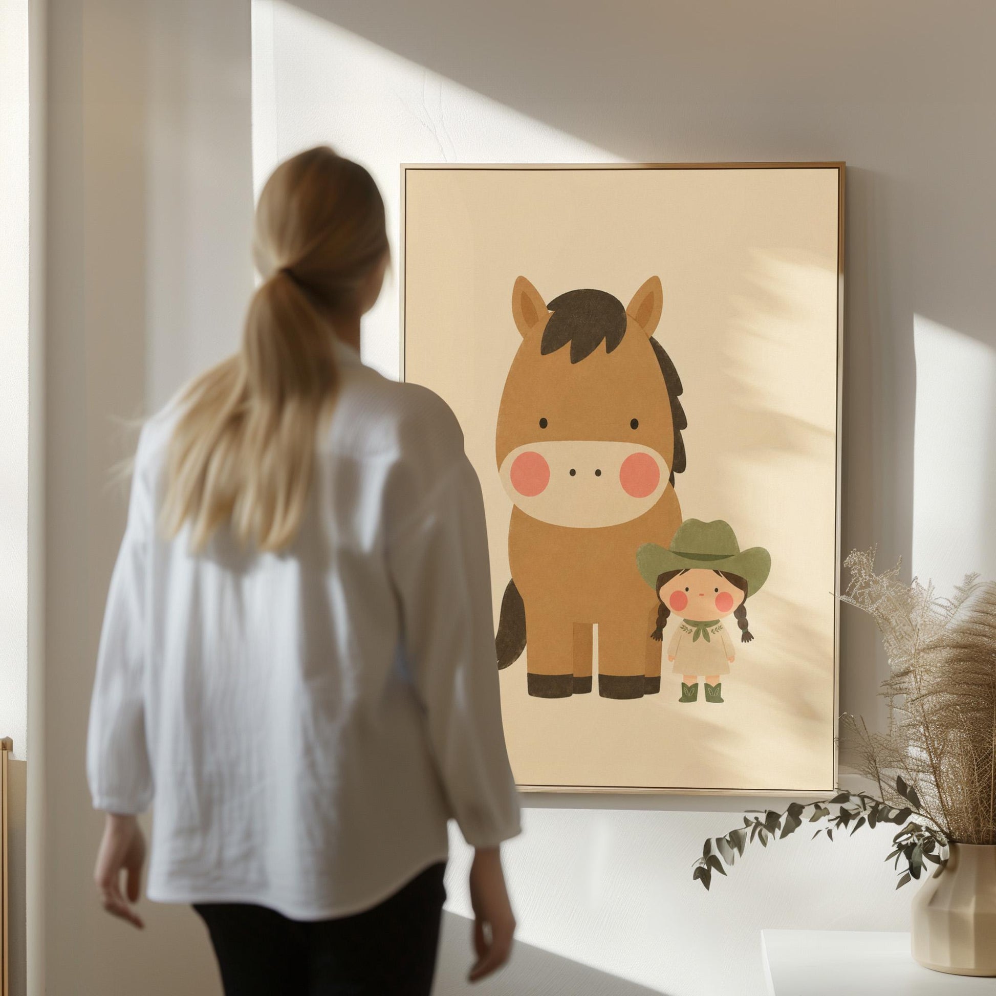 Brown pony standing beside a tiny cowgirl in a green hat, canvas wall art styled against a soft white wall