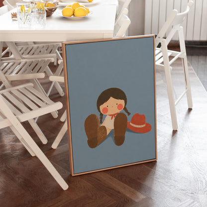 Little cowgirl sitting with big brown boots and a red hat, canvas print shown to scale in a furnished room