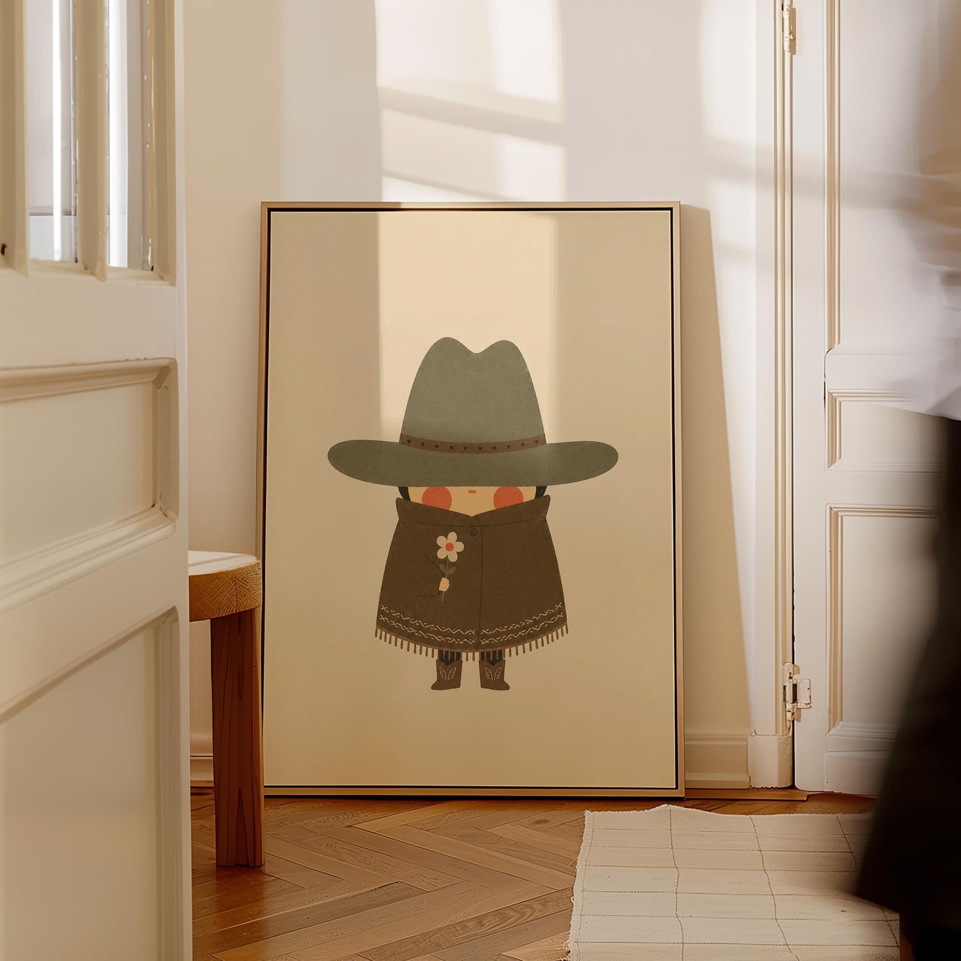 Tiny cowboy in a wide hat and fringed coat holding a daisy, canvas print styled against a soft white wall