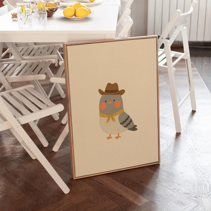 Round grey bird wearing a tiny cowboy hat and yellow bandana, canvas print seen in a warm interior with natural light