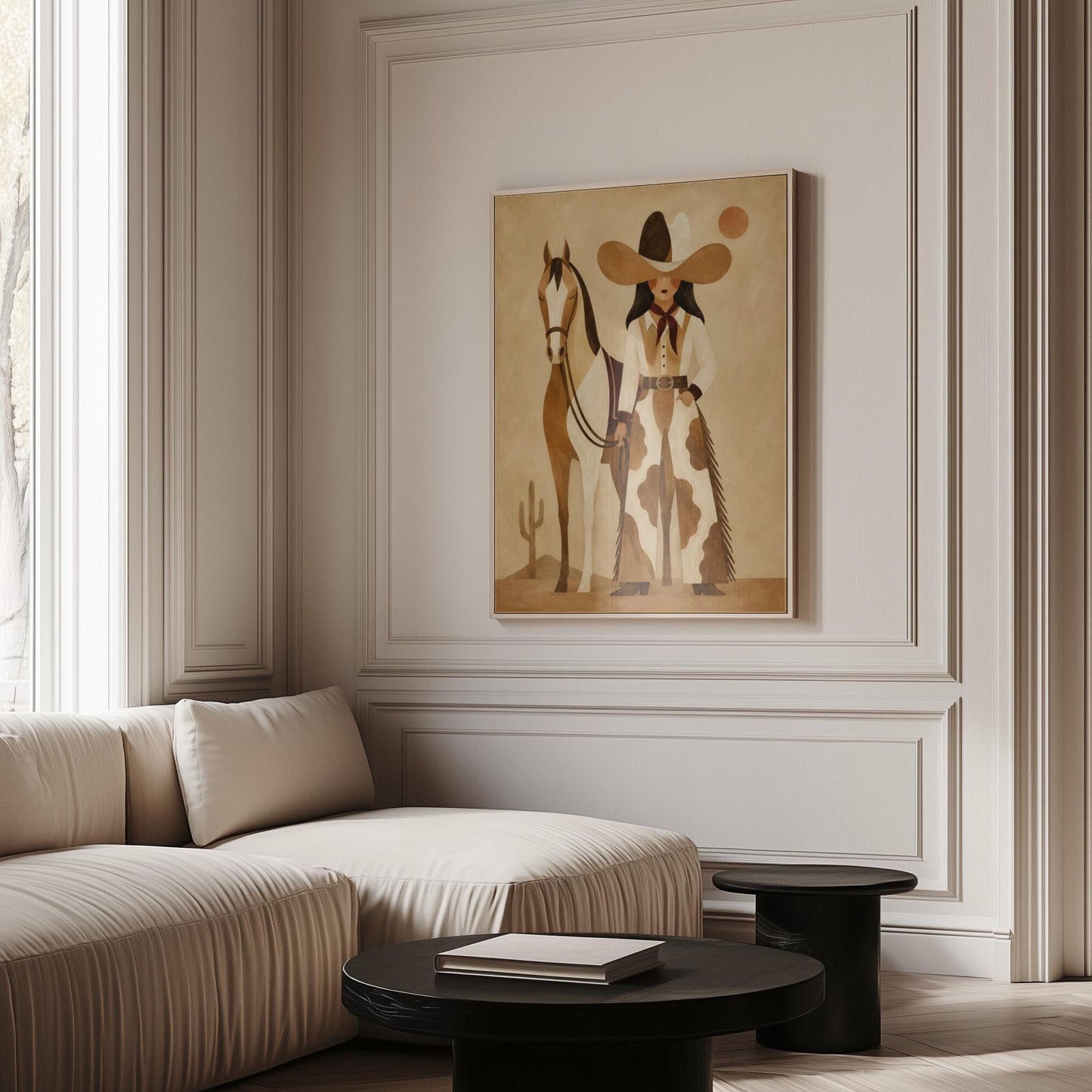 Cowgirl in cow print chaps standing beside a horse in a warm desert scene, canvas print seen in a warm interior with natural light