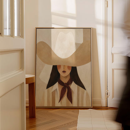 Close portrait of a cowgirl under a tan wide brim hat with a plum scarf, canvas print on a quiet wall in a considered interior