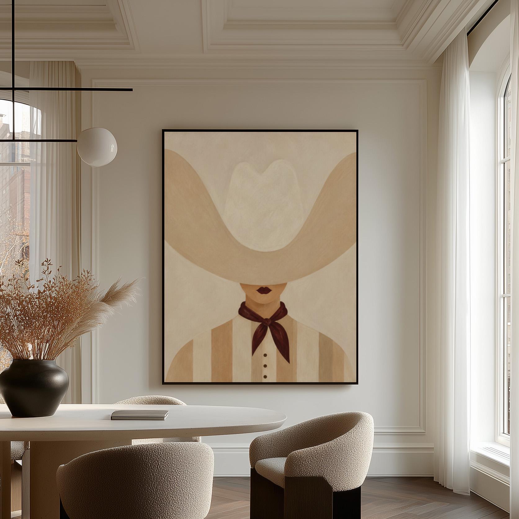 Woman under an oversized pale cowboy hat with a plum neckerchief, canvas wall art hanging in a calm, modern living space
