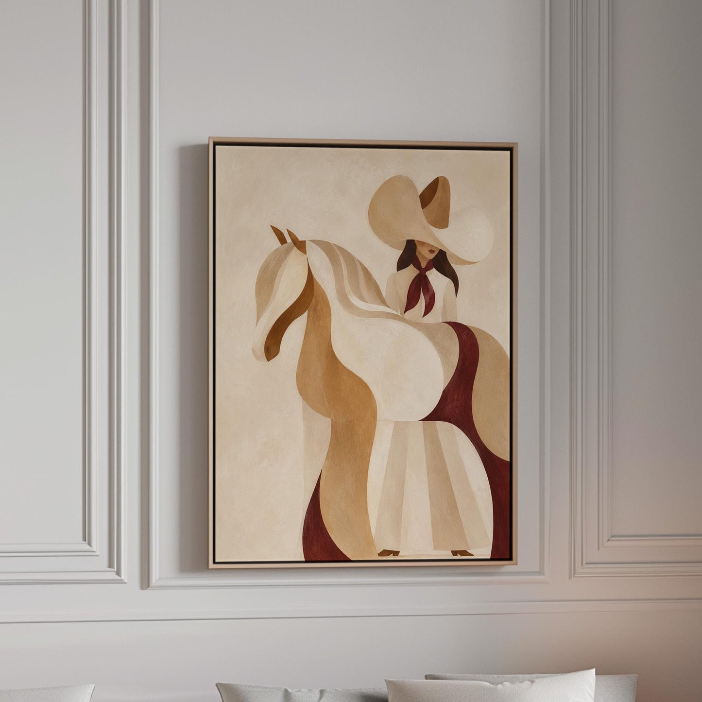 Stylised cream horse in curved shapes with a rider in white above it, canvas print in a bright room with natural daylight
