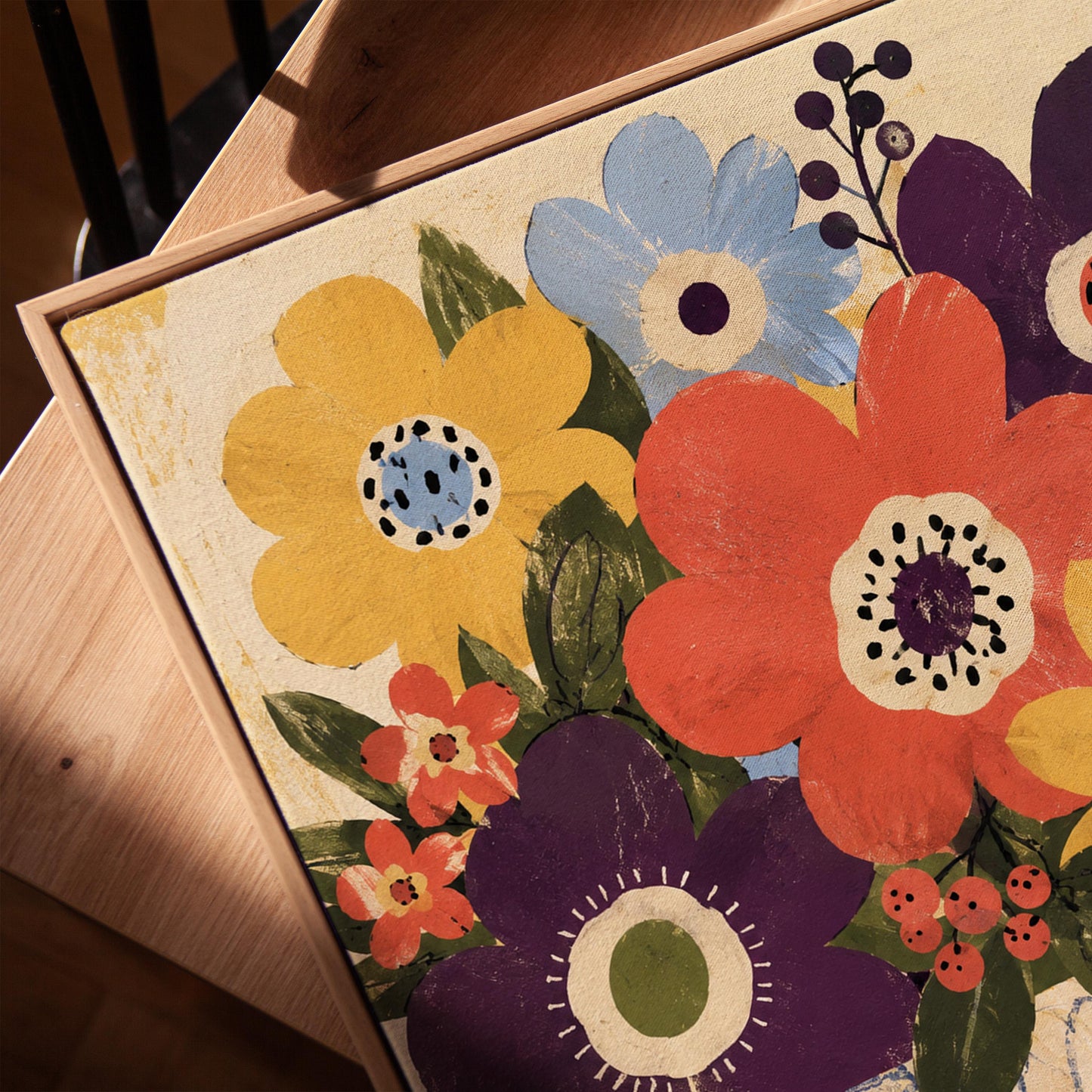 Bright folk bouquet in a white urn set on a checkerboard tabletop, canvas print in a warm, minimally styled interior