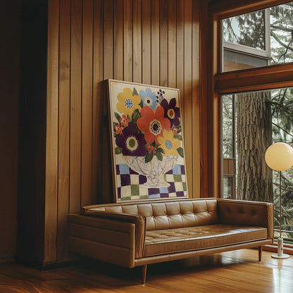 Bright folk bouquet in a white urn set on a checkerboard tabletop, canvas wall art on a quiet wall in a considered interior