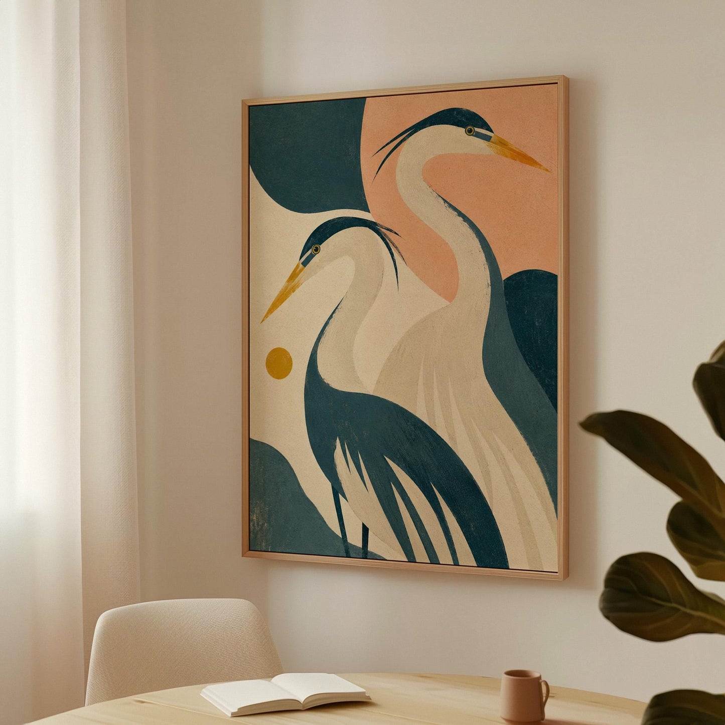 Two great herons with yellow beaks against a peach and teal sky, canvas print shown in a sunlit, contemporary room