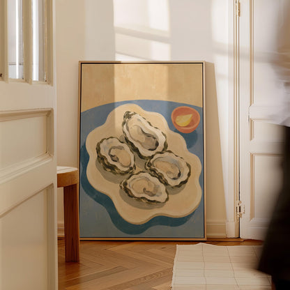 Four open oysters on a cream platter with lemon on a dusty blue ground, canvas print presented in a light, minimal room