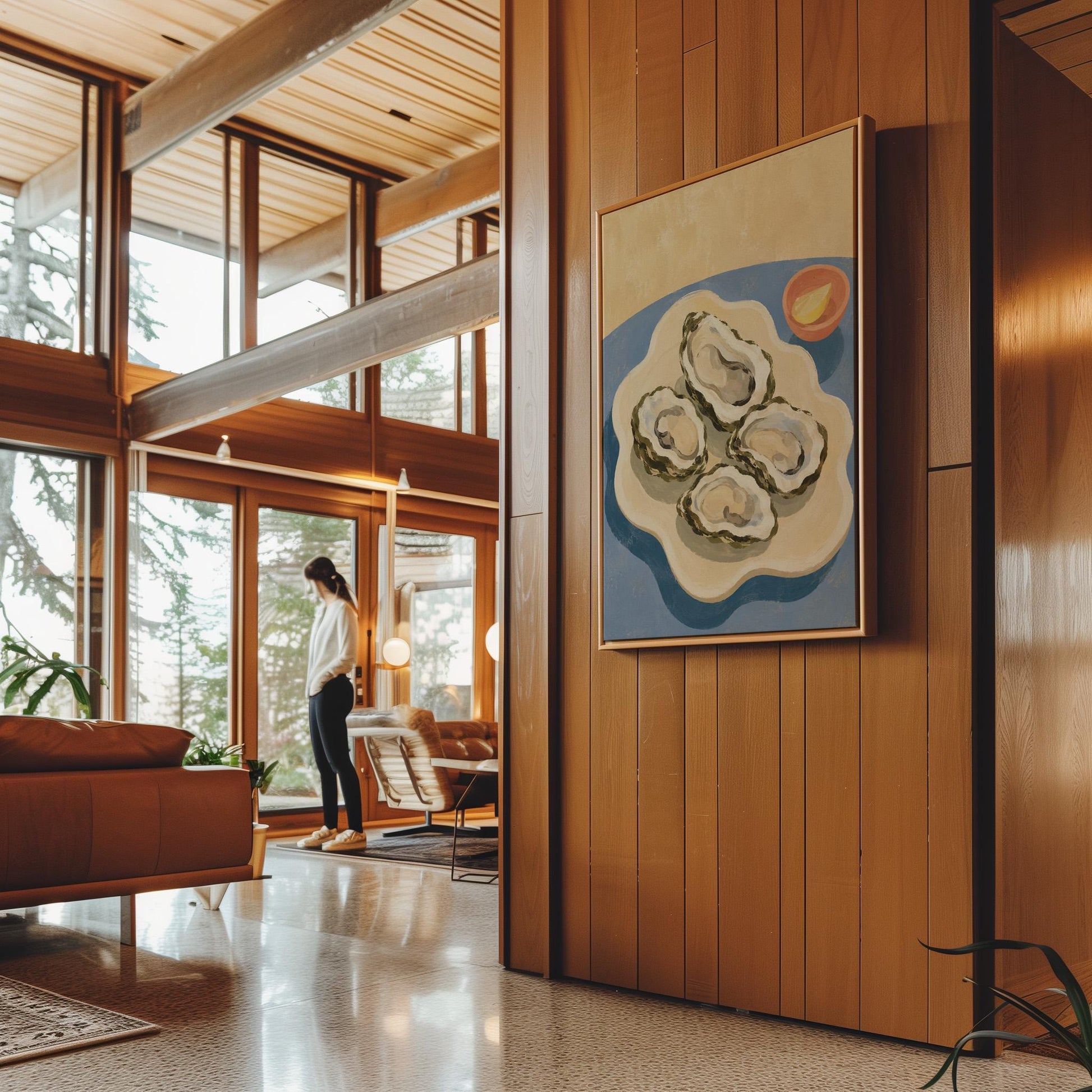 Four open oysters on a cream platter with lemon on a dusty blue ground, canvas print shown to scale in a furnished room