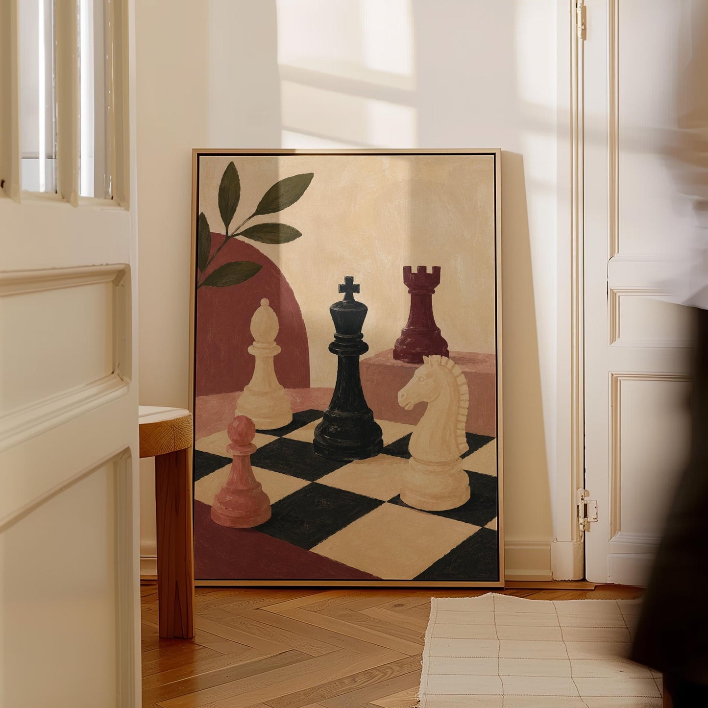 Chess pieces on a tilted board with an olive sprig and a red arch, canvas wall art hanging in a calm, modern living space