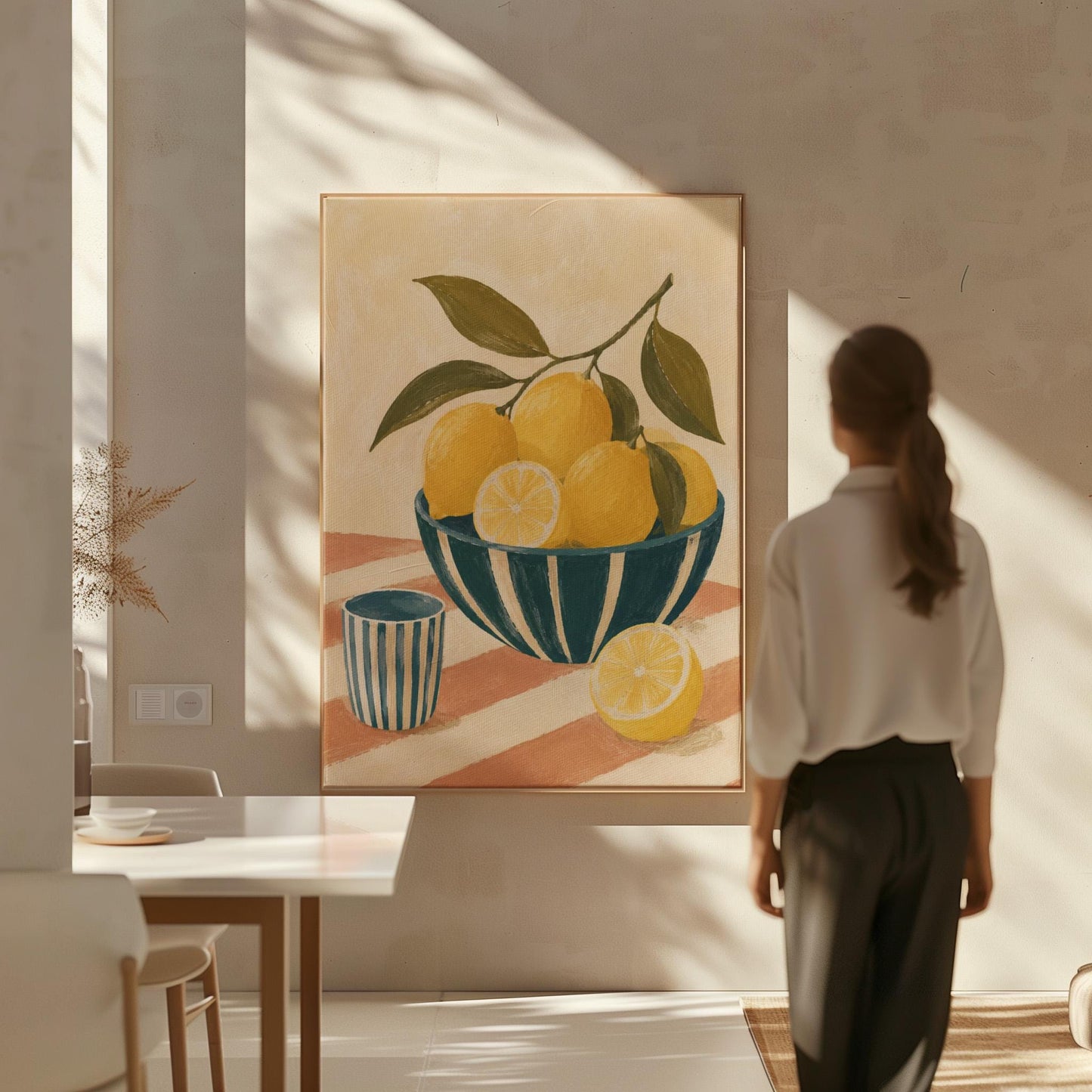Lemons on the branch in a teal striped bowl on a pink striped cloth, canvas print styled against a soft white wall