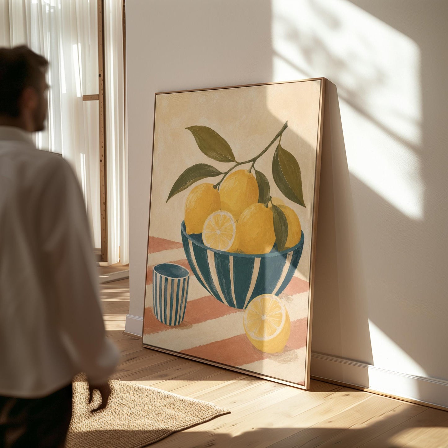 Lemons on the branch in a teal striped bowl on a pink striped cloth, canvas wall art presented in a light, minimal room