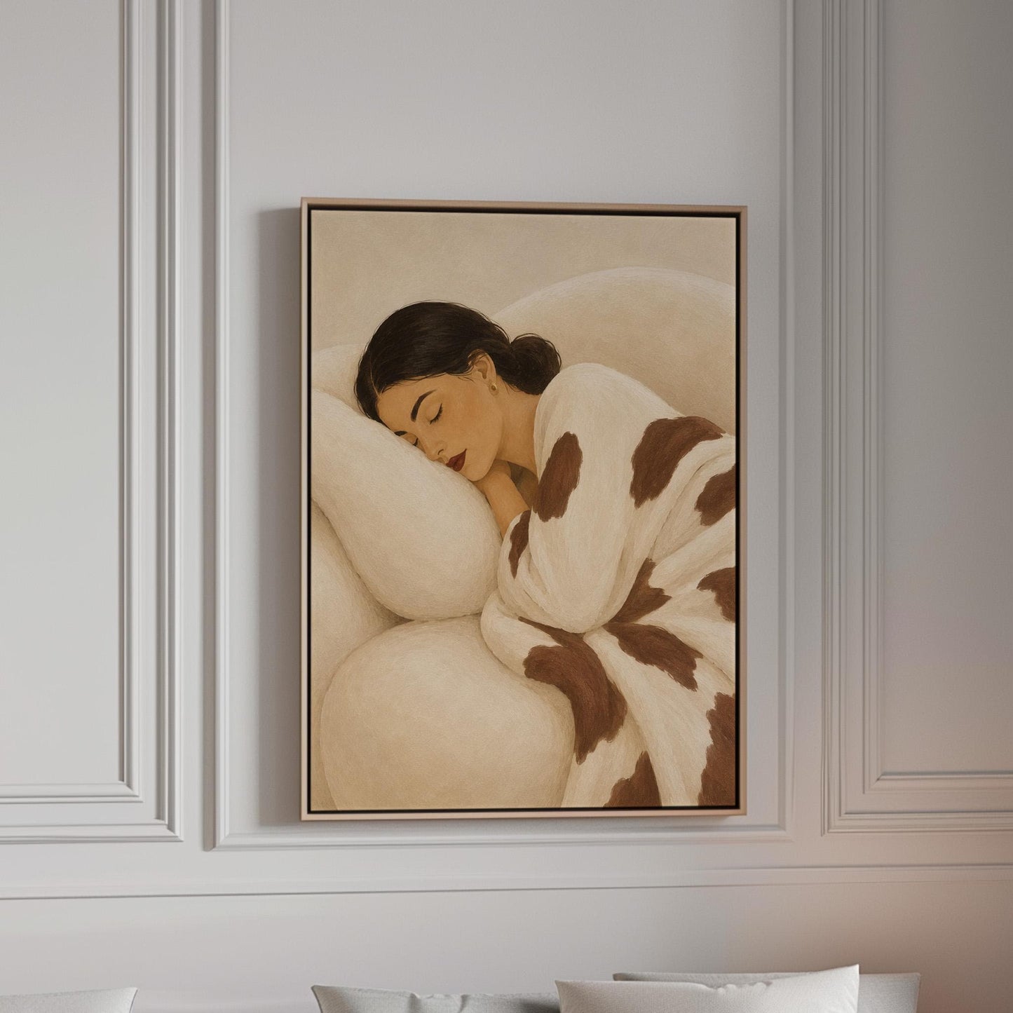 Woman asleep on a pillow under a cream blanket with brown markings, canvas print in a bright room with natural daylight