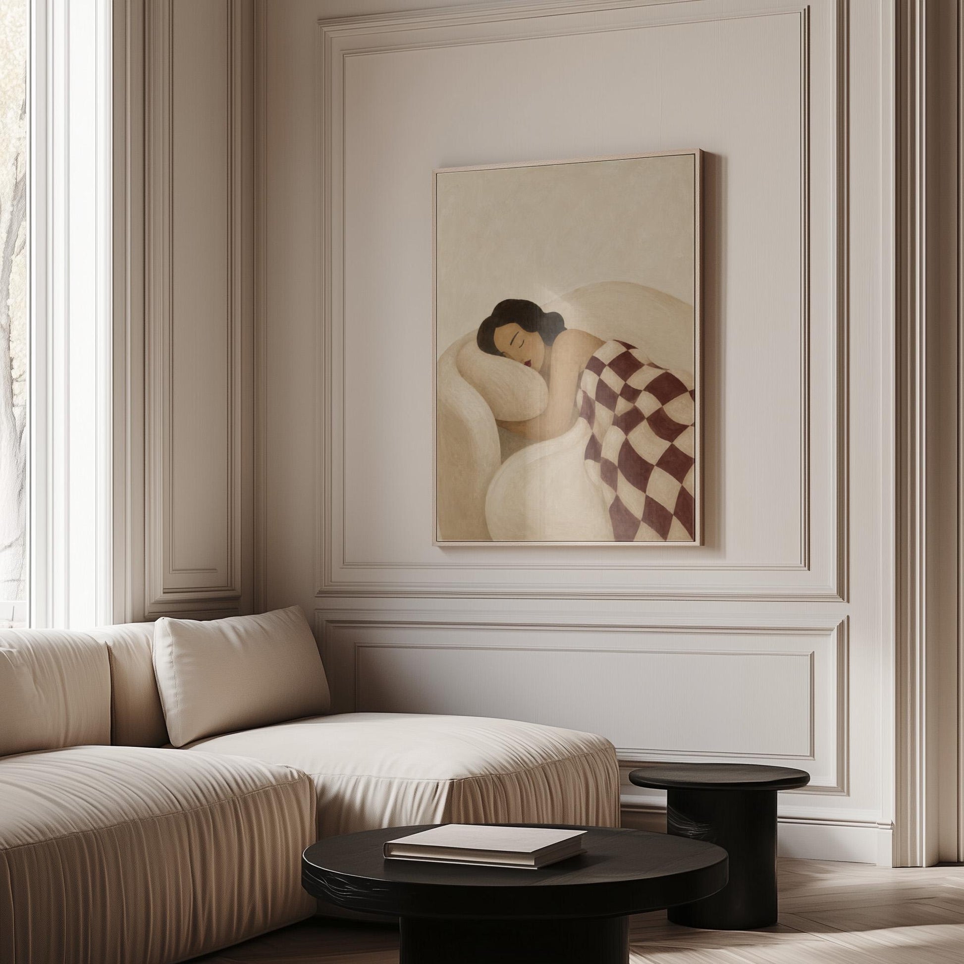 Woman sleeping under a burgundy and cream checkerboard blanket, canvas print seen in a warm interior with natural light