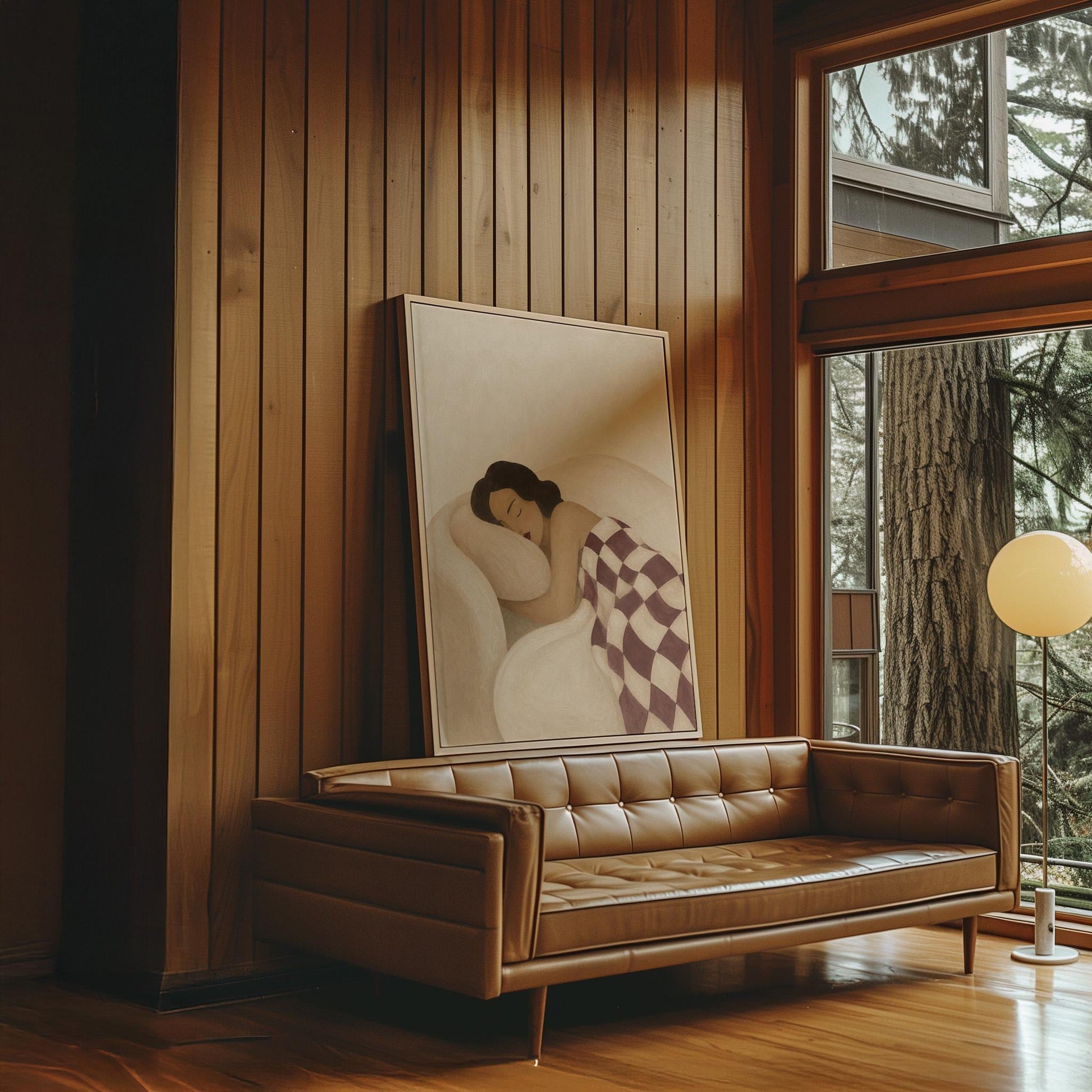 Woman sleeping under a burgundy and cream checkerboard blanket, canvas print on a quiet wall in a considered interior