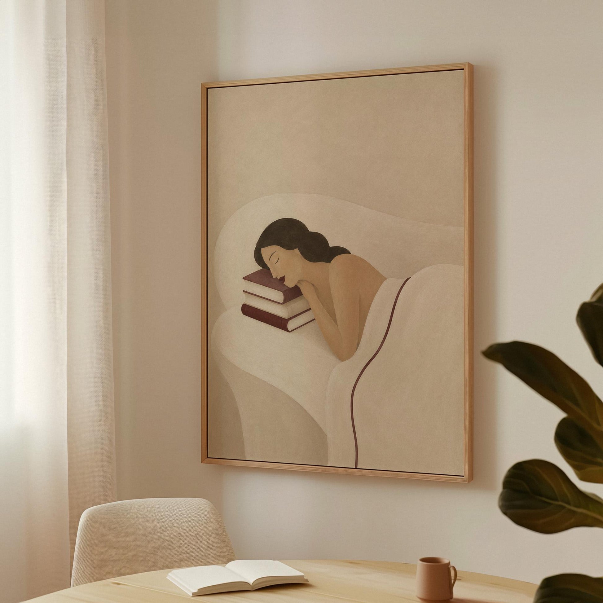 Woman resting her cheek on a stack of cream and burgundy books, canvas wall art presented in a light, minimal room