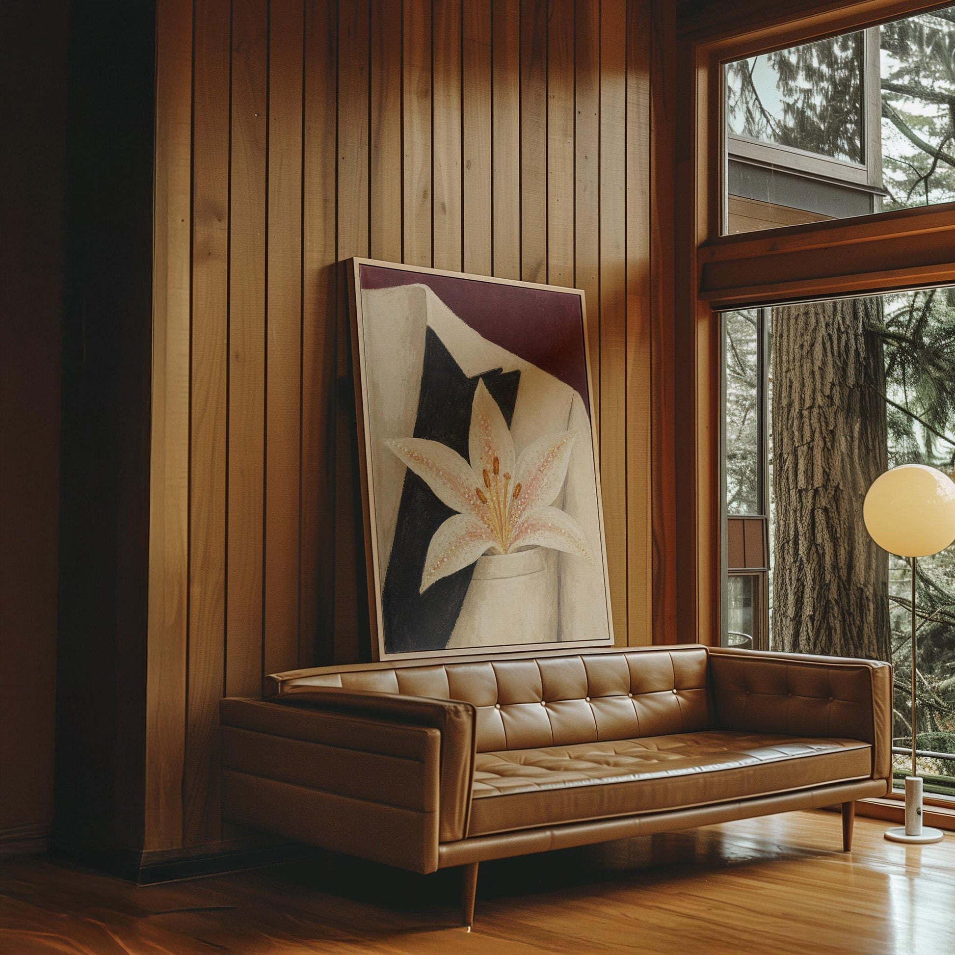 White pearl flecked lily on a cream tuxedo lapel over deep burgundy, canvas wall art hanging in a calm, modern living space