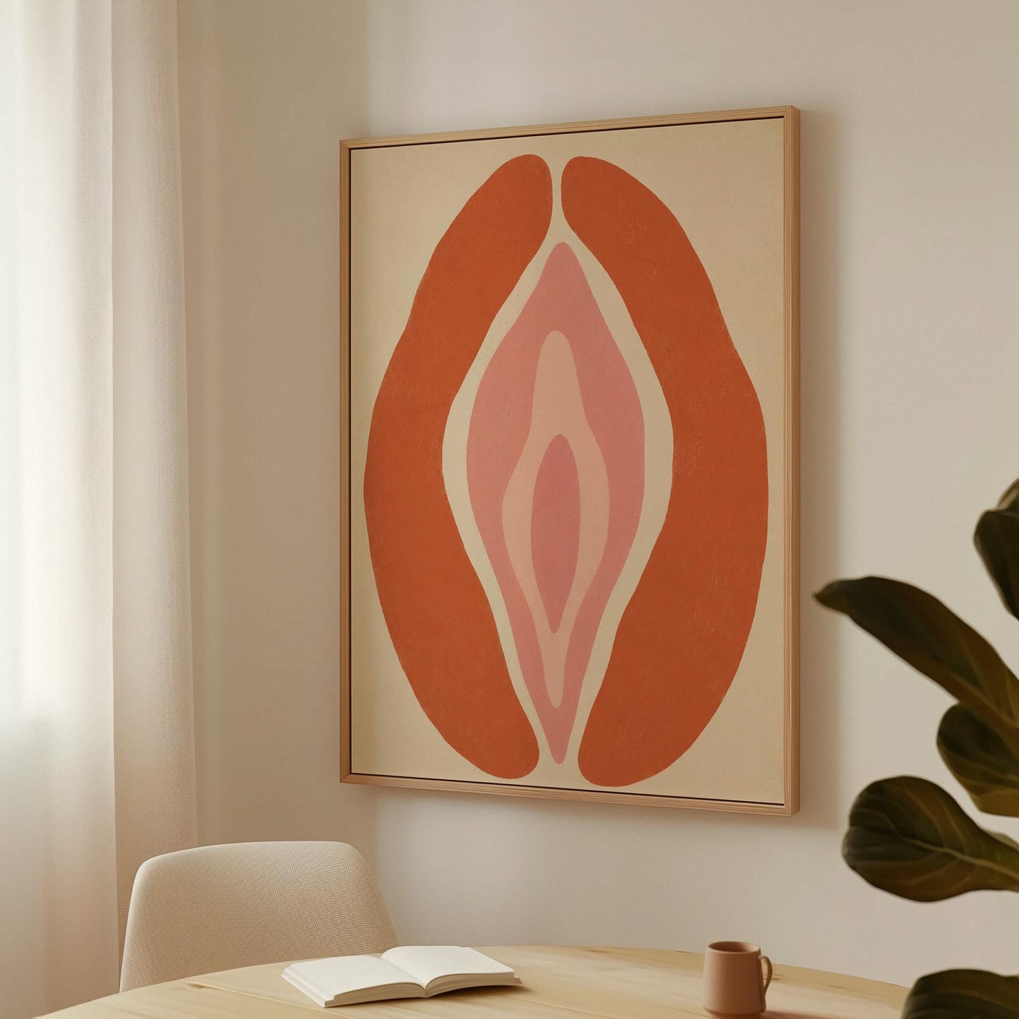 Rust orange arcs curving around a nested blush pink core on sand, canvas print displayed on a neutral wall in a styled interior