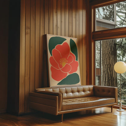 Scarlet flower with gold stamens over deep green leaves on sand, canvas print shown in a sunlit, contemporary room
