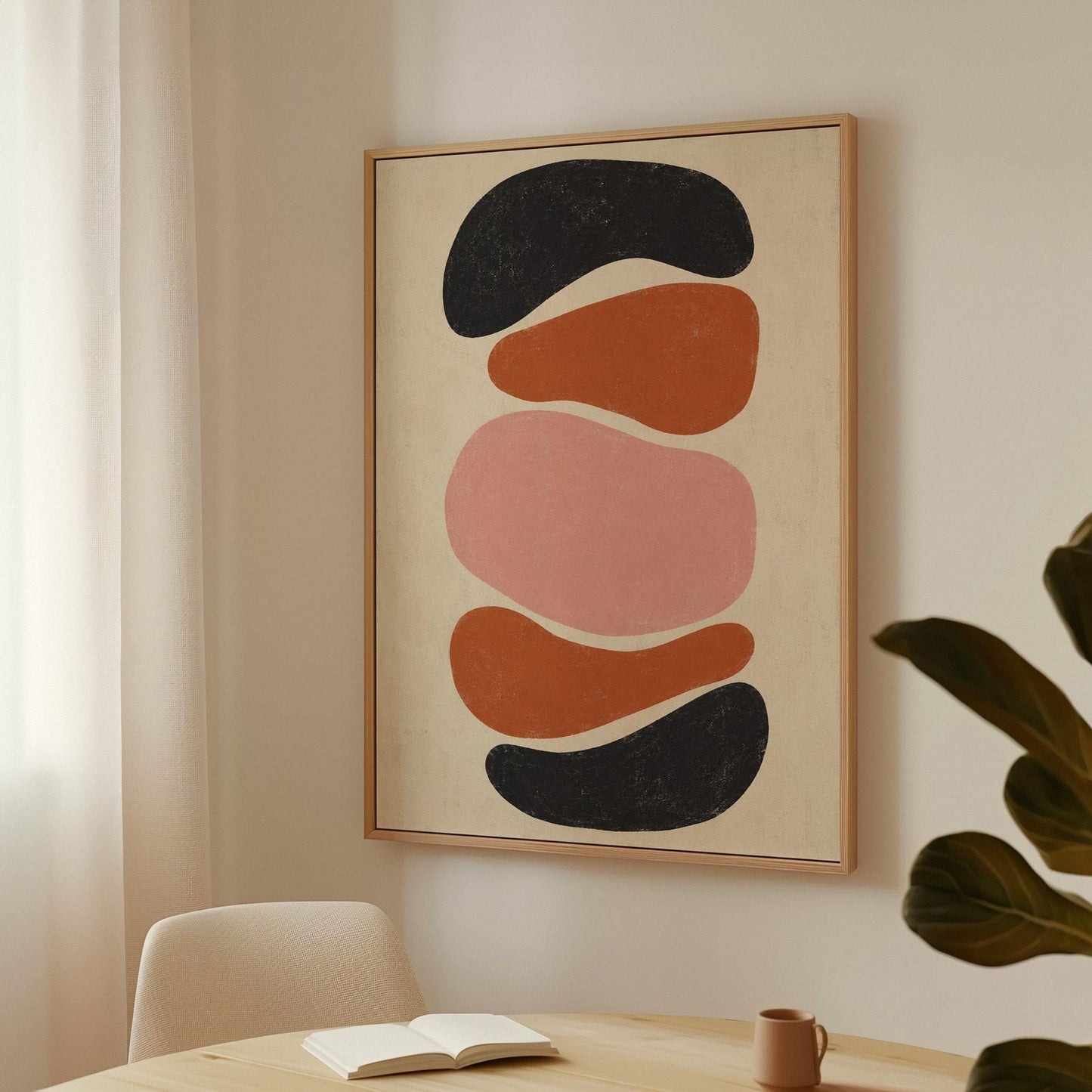 Five stacked pebble shapes in charcoal rust and blush on cream, canvas print hanging in a calm, modern living space