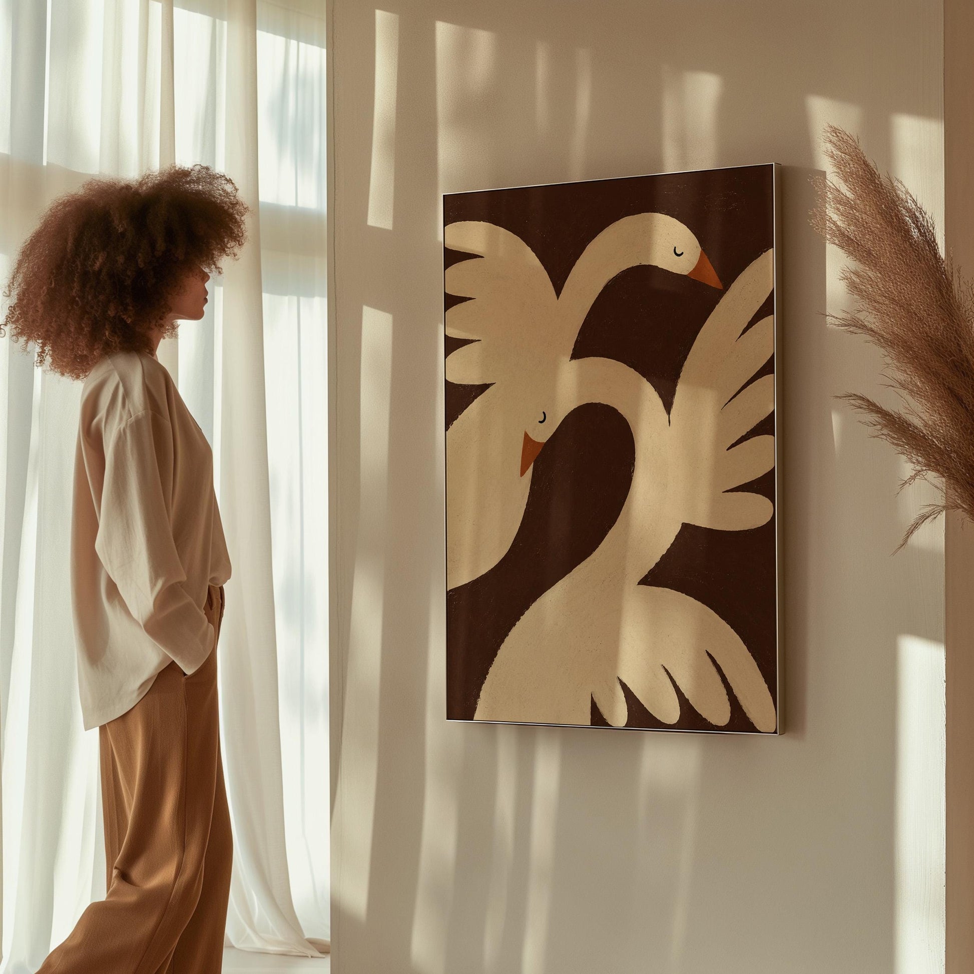 Two cream doves with orange beaks crossing wings on dark brown, canvas print shown in a sunlit, contemporary room