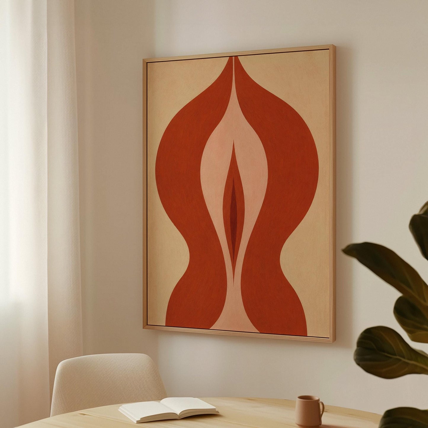 Rust red flame shaped form opening into blush and grey on sand, canvas print seen in a warm interior with natural light