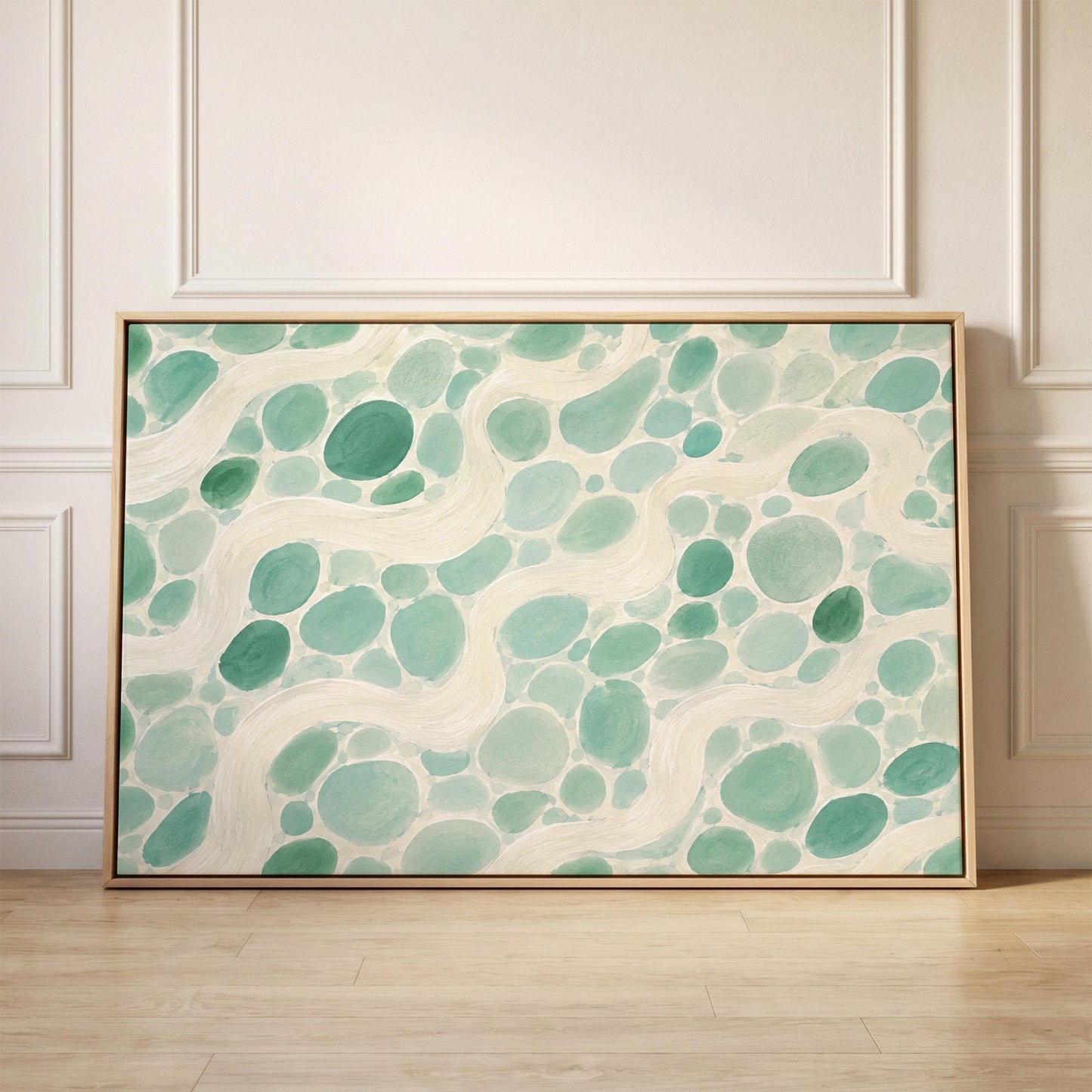 Aqua pebbles flowing like a stream horizontally, canvas print held up against a sunlit bedroom wall