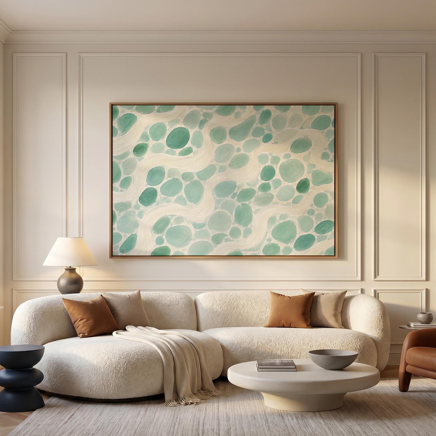 Aqua pebbles flowing like a stream horizontally, canvas print shown in a sunlit, contemporary room