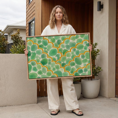 Green scallop scales with golden trim rows, canvas wall art hanging in a calm, modern living space