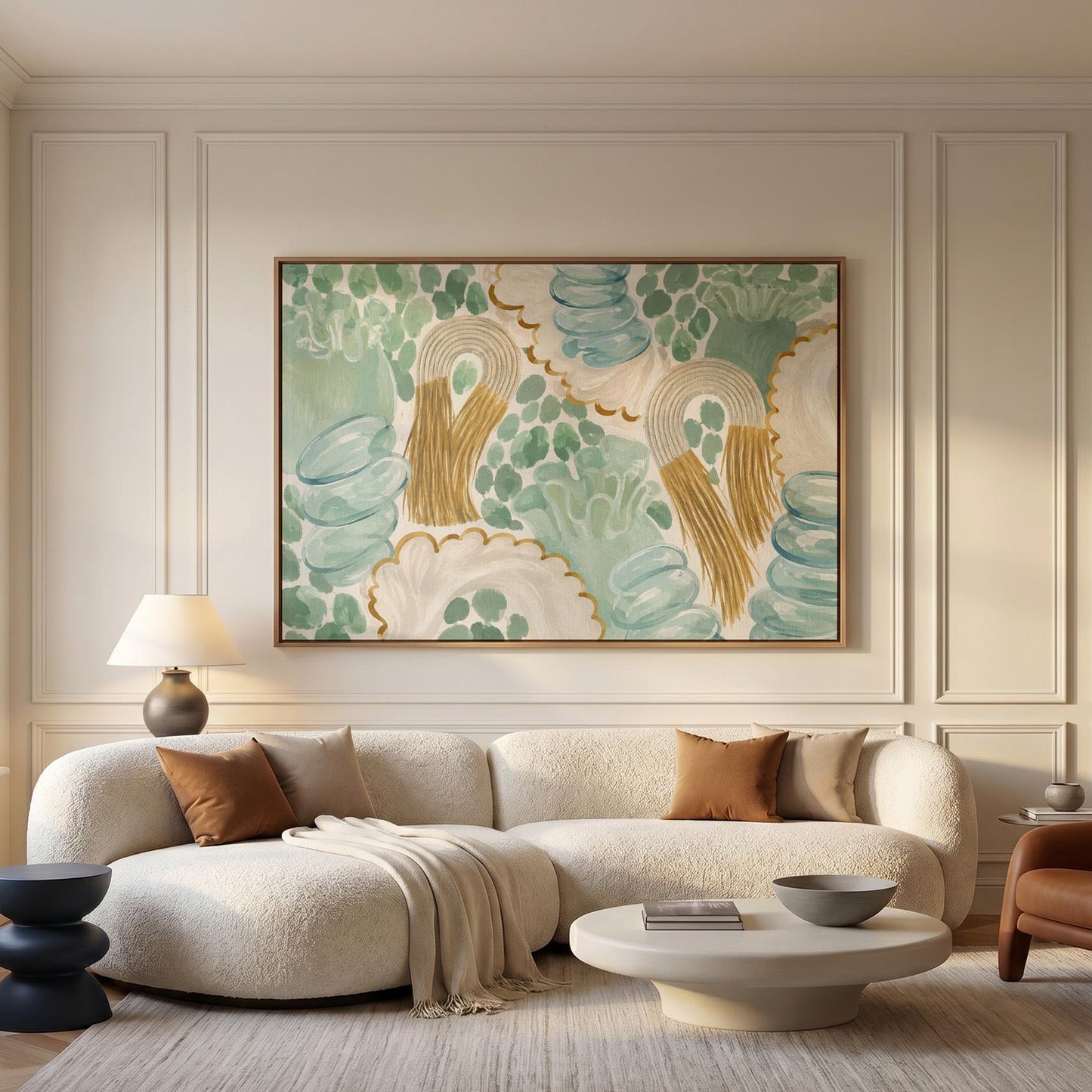 Celadon shapes with golden tassel ornaments, canvas wall art hanging in a calm, modern living space