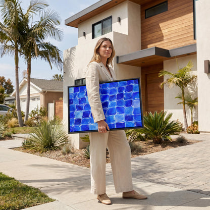 Deep sapphire mosaic tiles in wide grid, canvas print seen in a warm interior with natural light