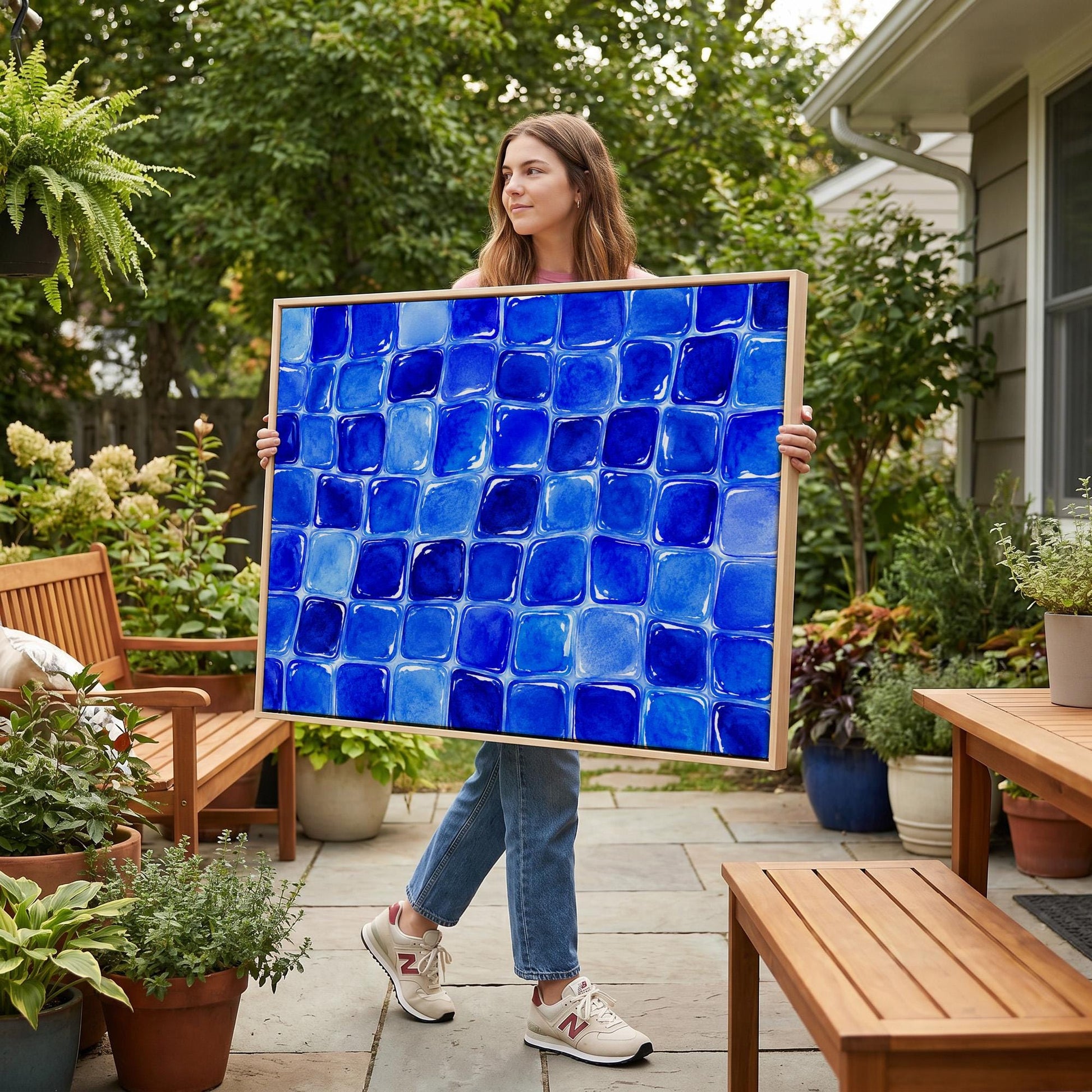 Deep sapphire mosaic tiles in wide grid, canvas print displayed on a neutral wall in a styled interior
