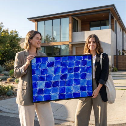 Deep sapphire mosaic tiles in wide grid, canvas wall art styled against a soft white wall
