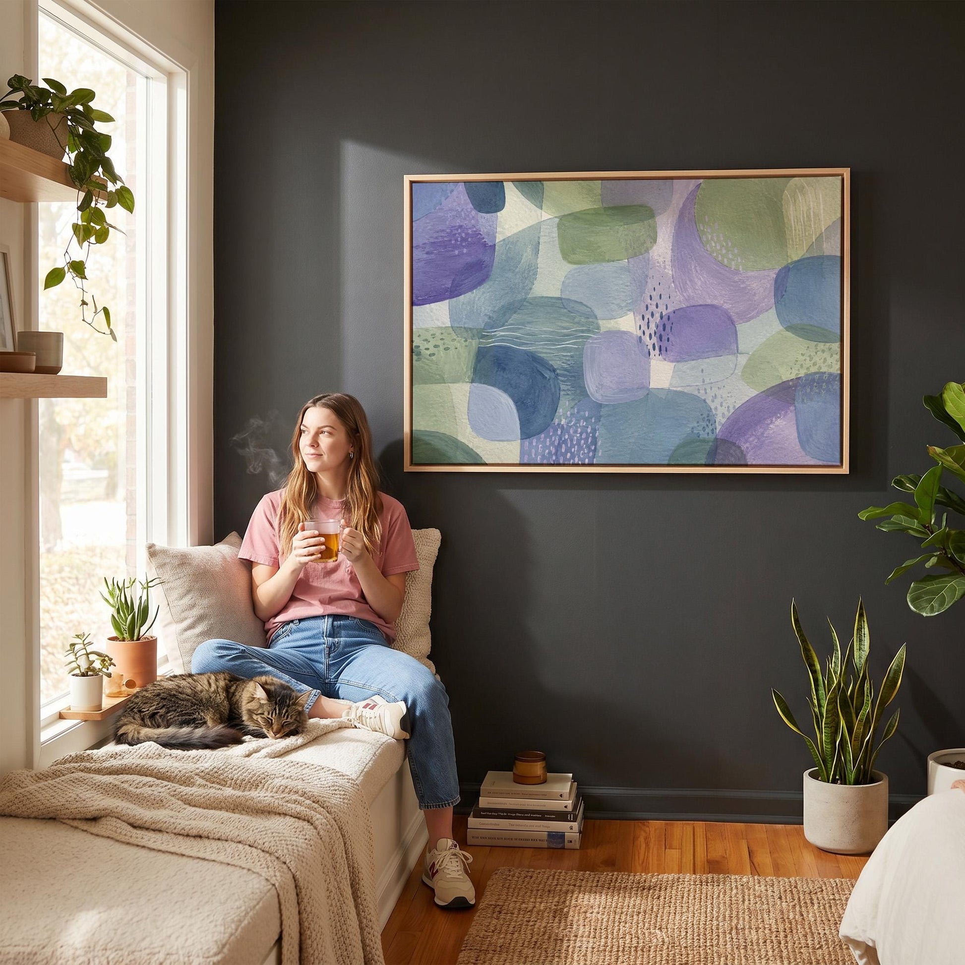 Soft muted shapes in dusty plum and sage, canvas print displayed on a neutral wall in a styled interior