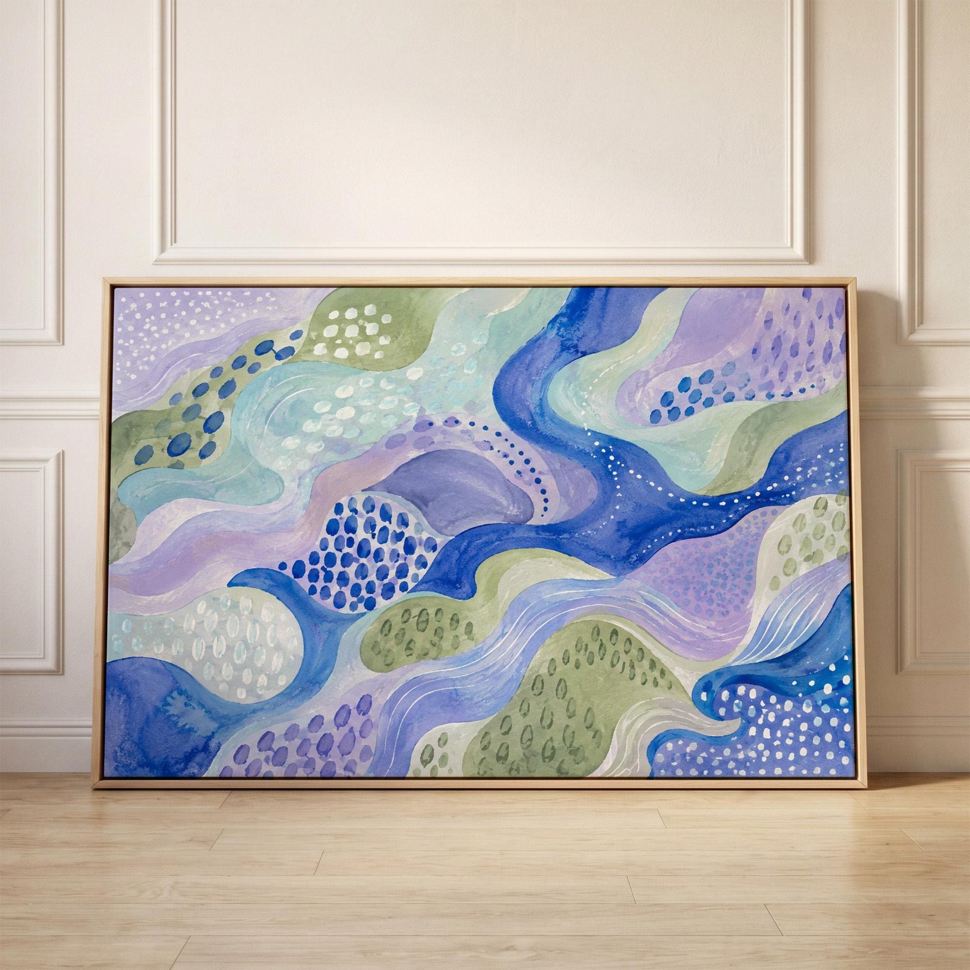 Meandering blue streams among dotted lavender islands, canvas print held up against a sunlit bedroom wall