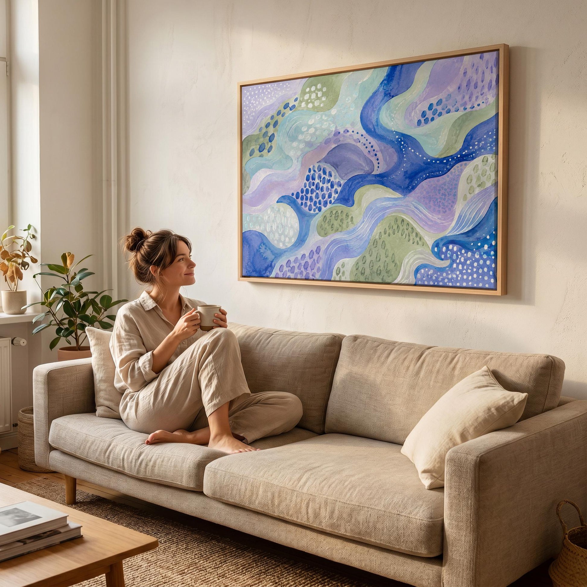 Meandering blue streams among dotted lavender islands, canvas print shown in a sunlit, contemporary room