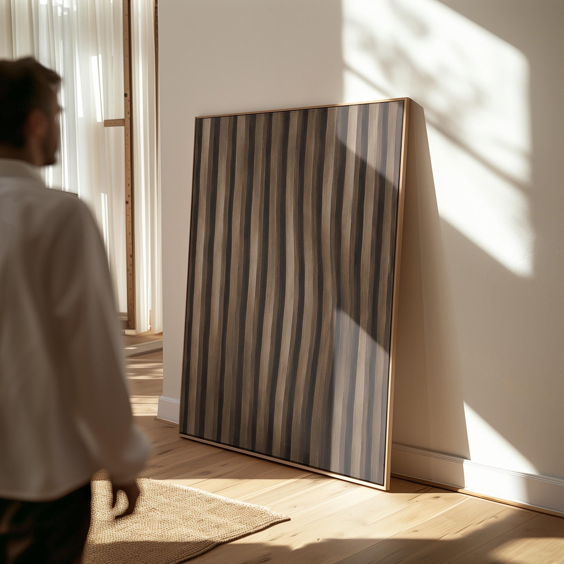 Vertical wavy stripes in dark walnut and coffee brown tones, canvas print seen in a warm interior with natural light