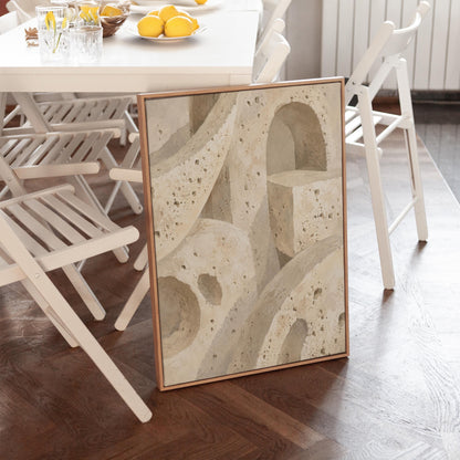 Interlocking arches and organic forms in warm speckled beige, canvas print displayed on a neutral wall in a styled interior
