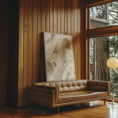 Interlocking arches and organic forms in warm speckled beige, canvas print shown in a sunlit, contemporary room