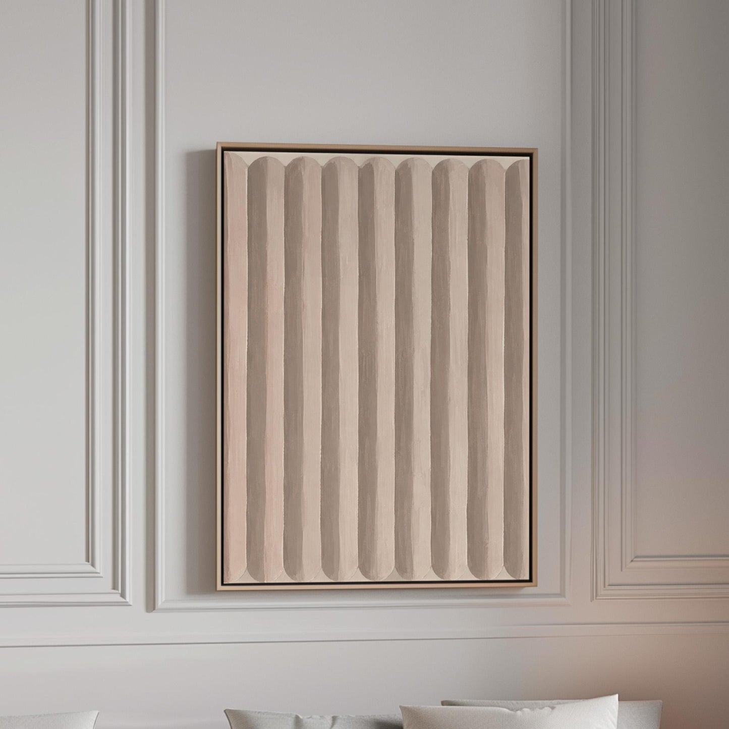 Vertical stripe pattern in blush pink and soft beige, canvas print in a bright room with natural daylight