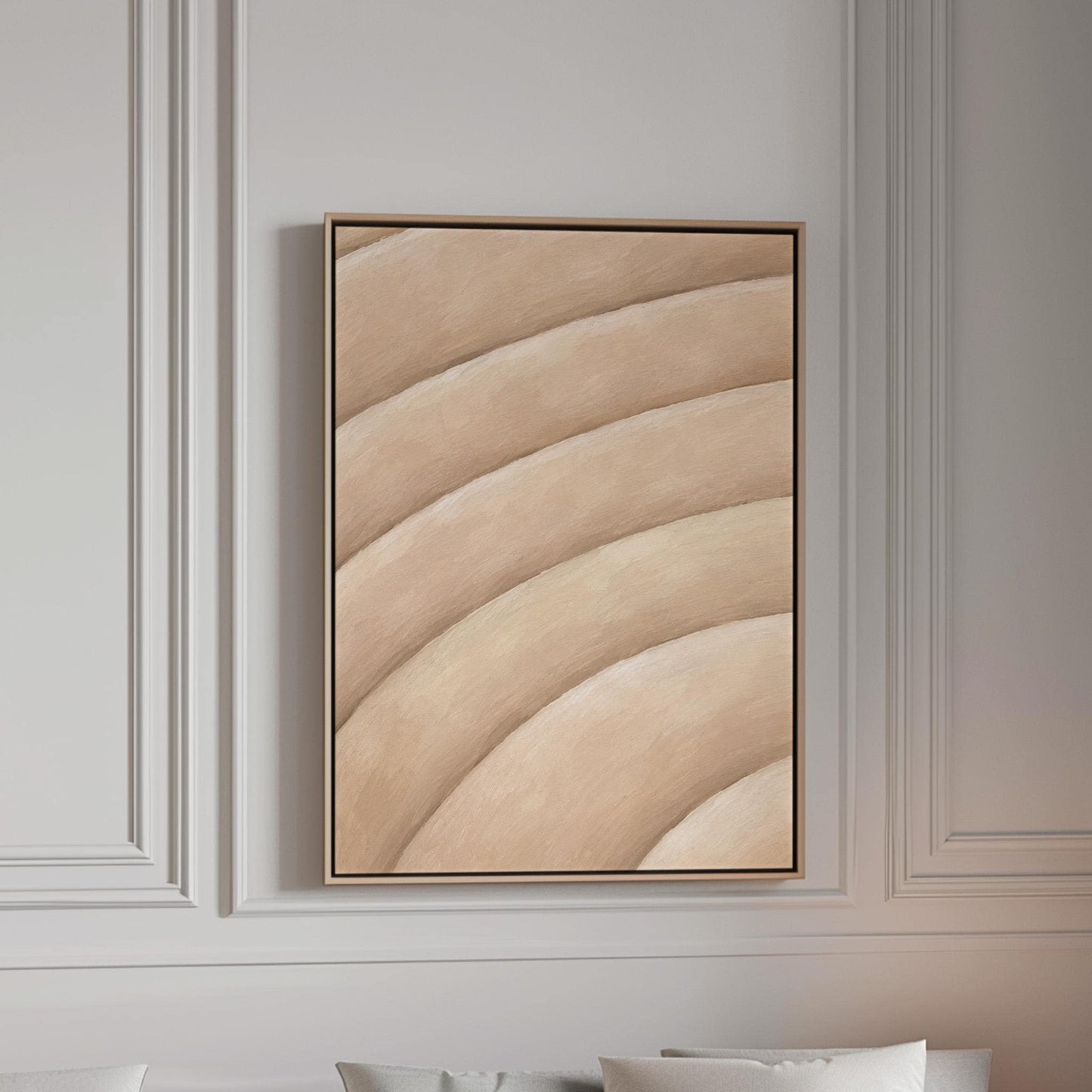 Broad sweeping arcs in cream and blush flowing across the frame, canvas print in a bright room with natural daylight