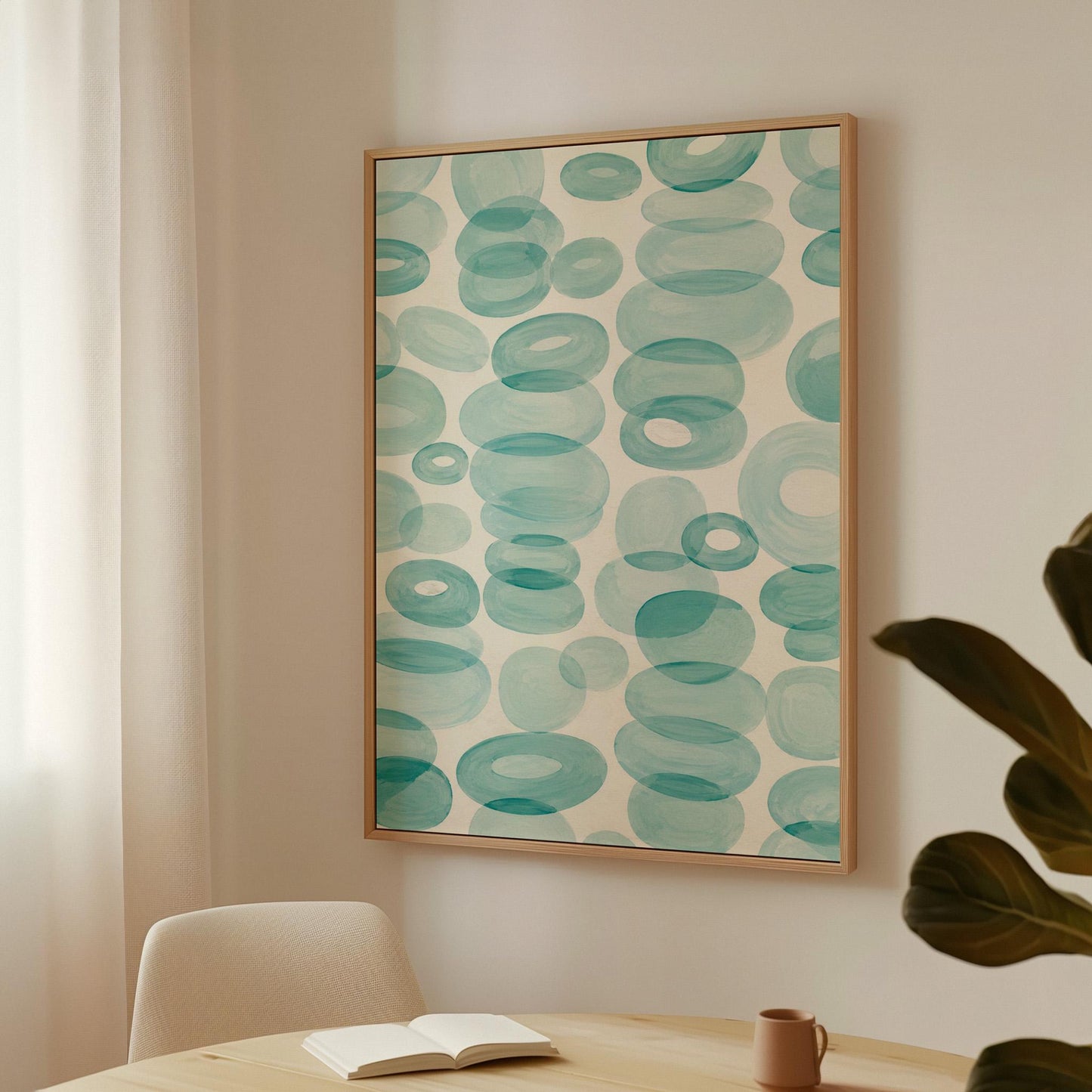 Watercolor rings and ovals in aqua and teal like sea glass, canvas print on a quiet wall in a considered interior