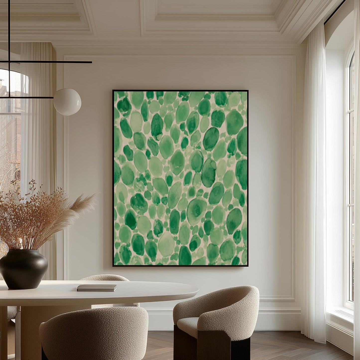 Dense watercolor pebble shapes in mint to emerald green, canvas wall art hanging in a calm, modern living space